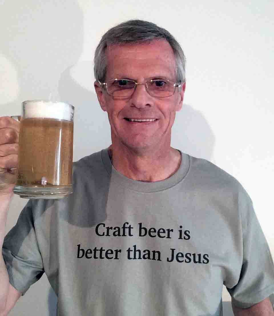 Darwin Bedford wearing his shirt that craft beer is better than Jesus