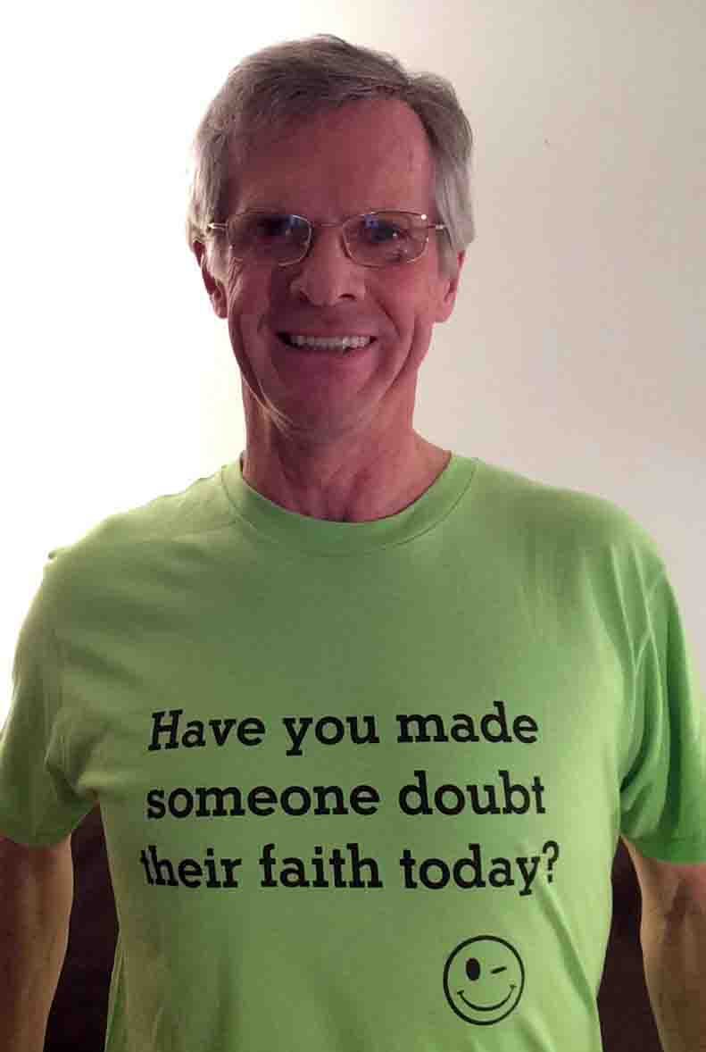 Darwin Bedford wearing his shirt that asks 'Have you made someone doubt their faith today'