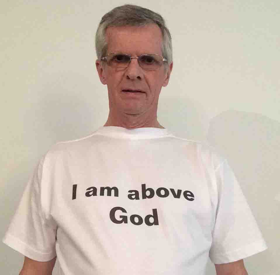 Darwin Bedford wearing his shirt that says 'I am above God'