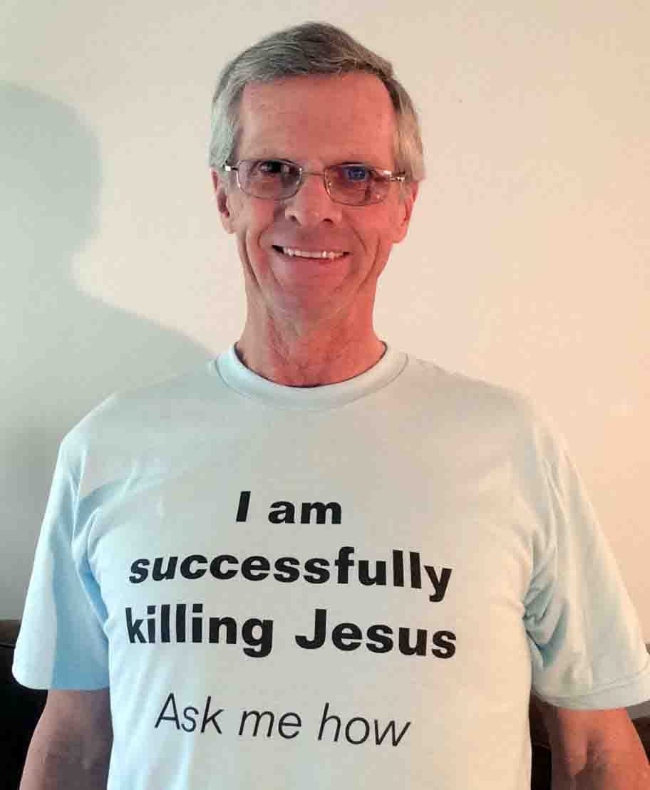 Darwin Bedford wearing his shirt that says 'I am successully killing Jesus; ask me how'