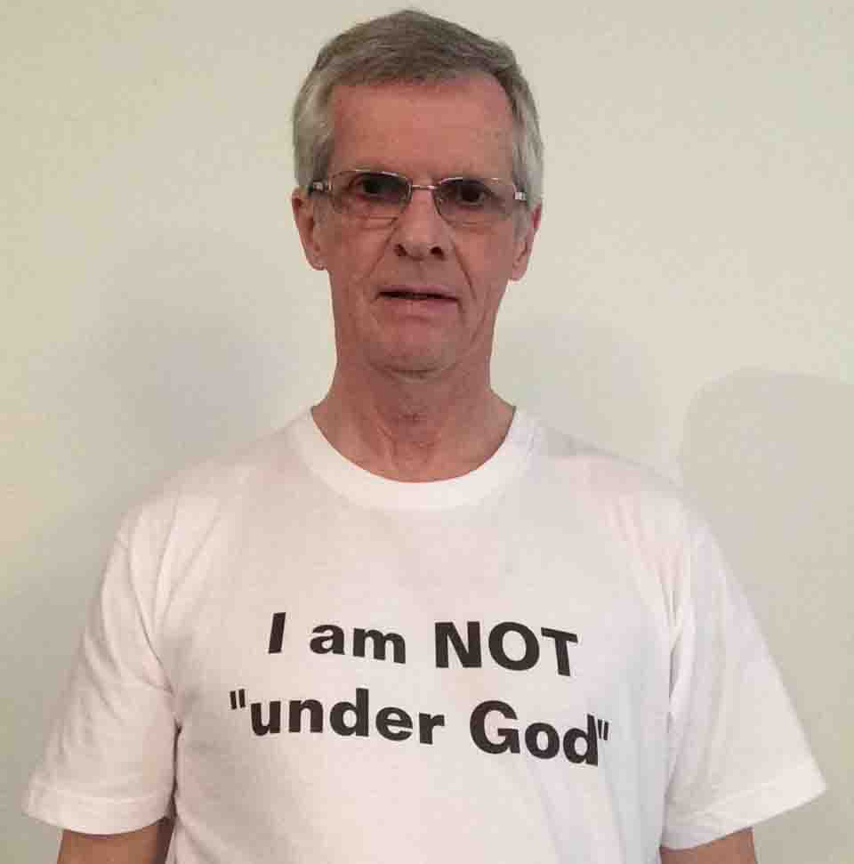 Darwin Bedford wearing his shirt that says 'I am NOT under God'