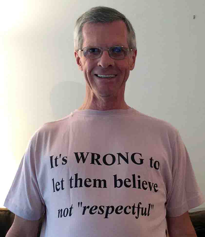 Darwin Bedford wearing his shirt that says 'It is WRONG to let them believe(not respectful)'