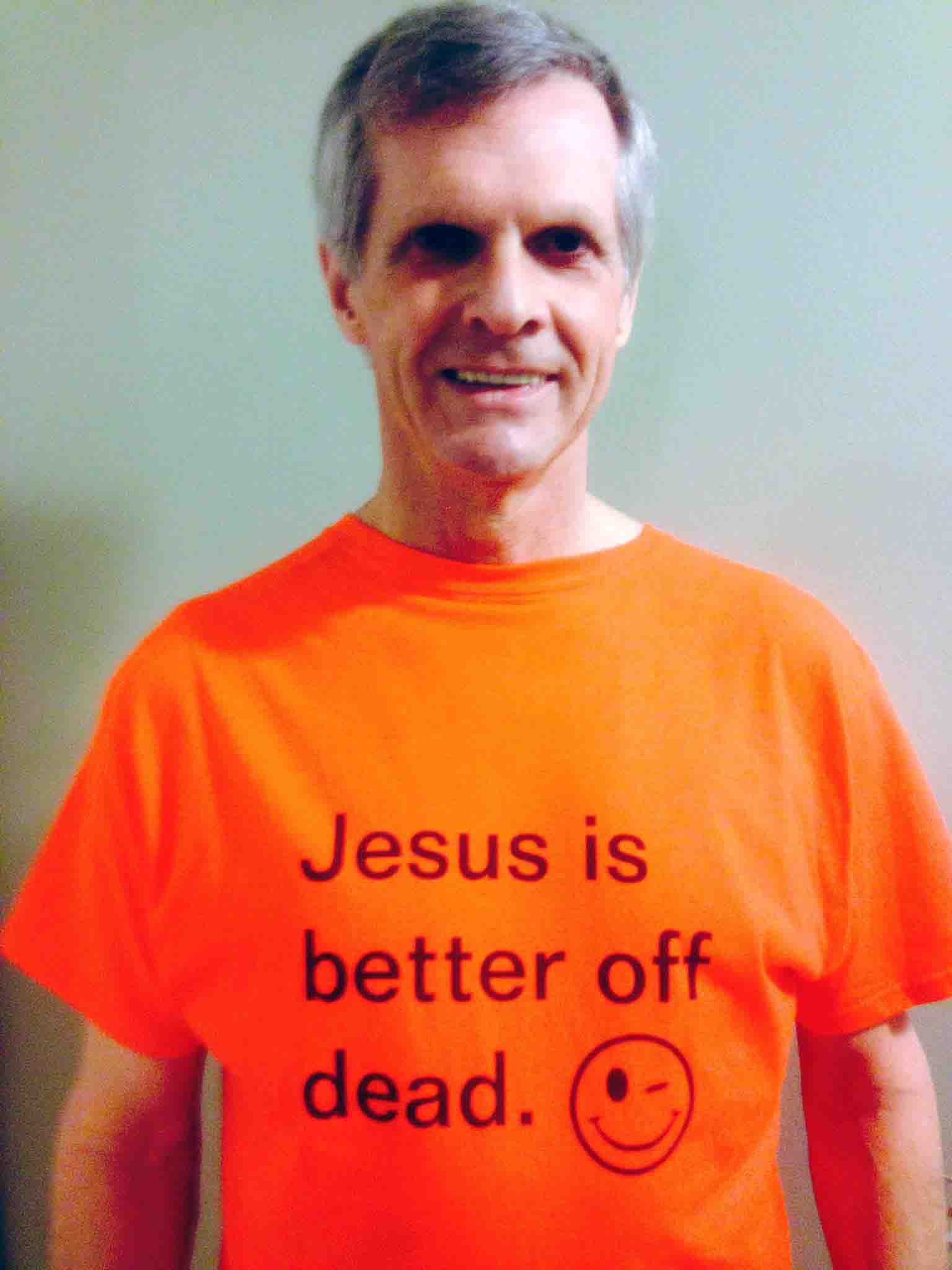 Darwin Bedford wearing his shirt that says 'Jesus is better off dead'