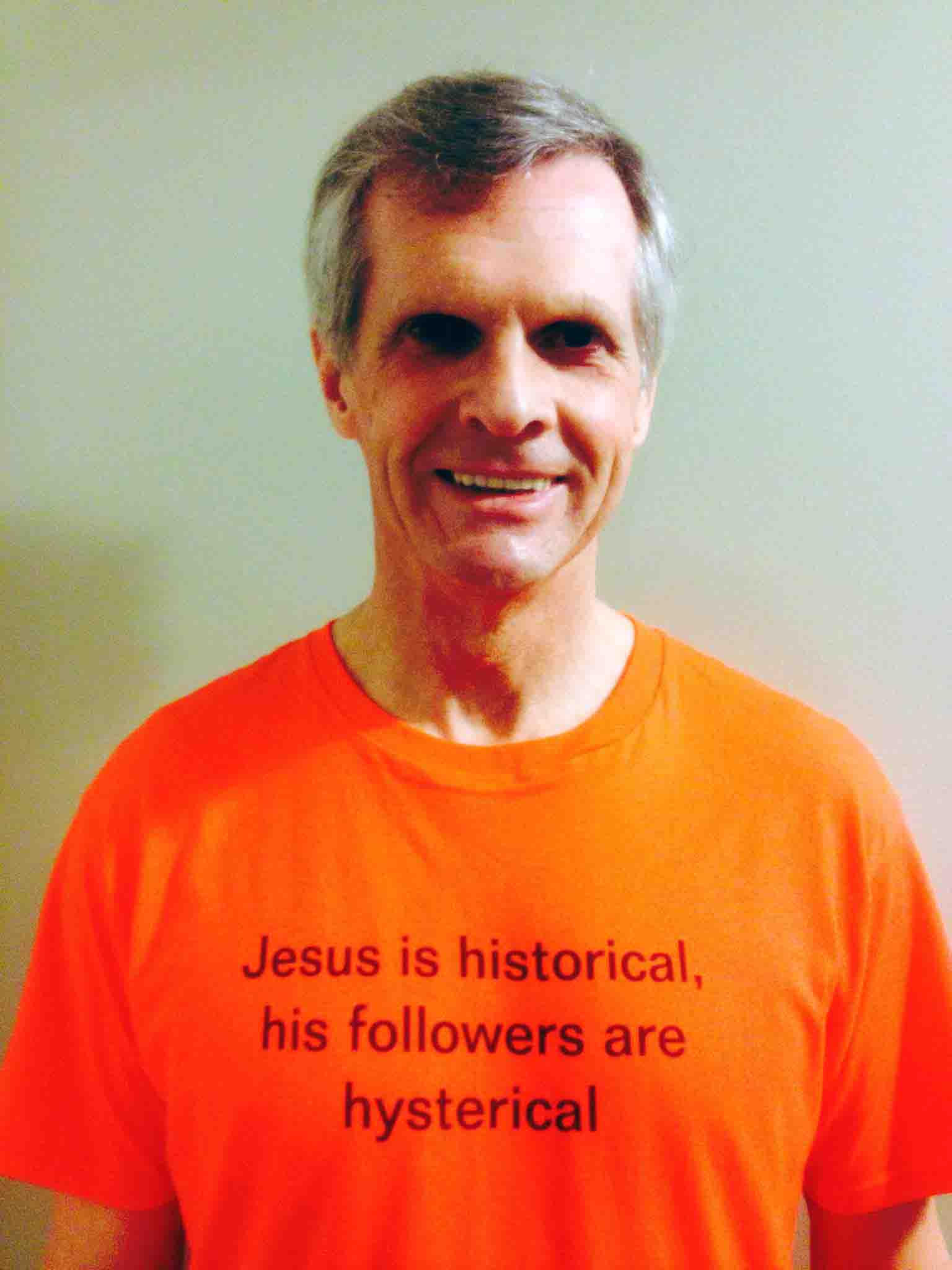 Darwin Bedford wearing his shirt that says 'Jesus is historical His followers are hysterical'