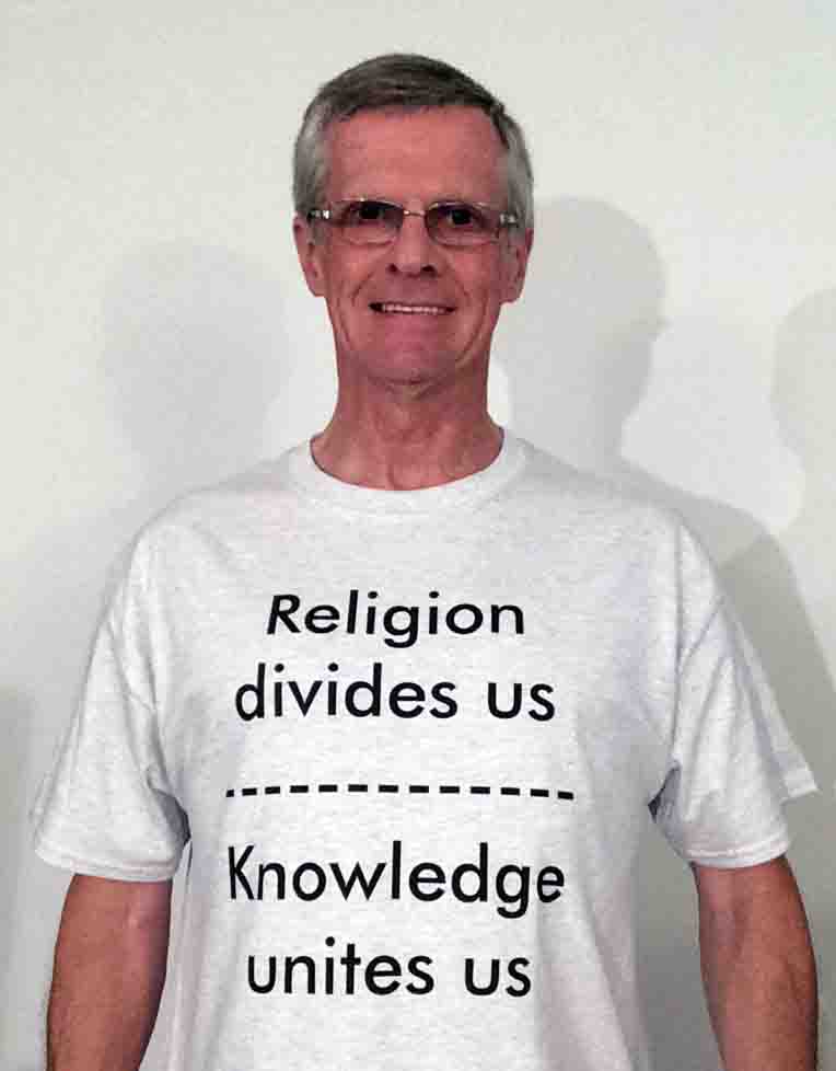 Darwin Bedford wearing his shirt that says 'Religion divides us, Knowledge unites us'