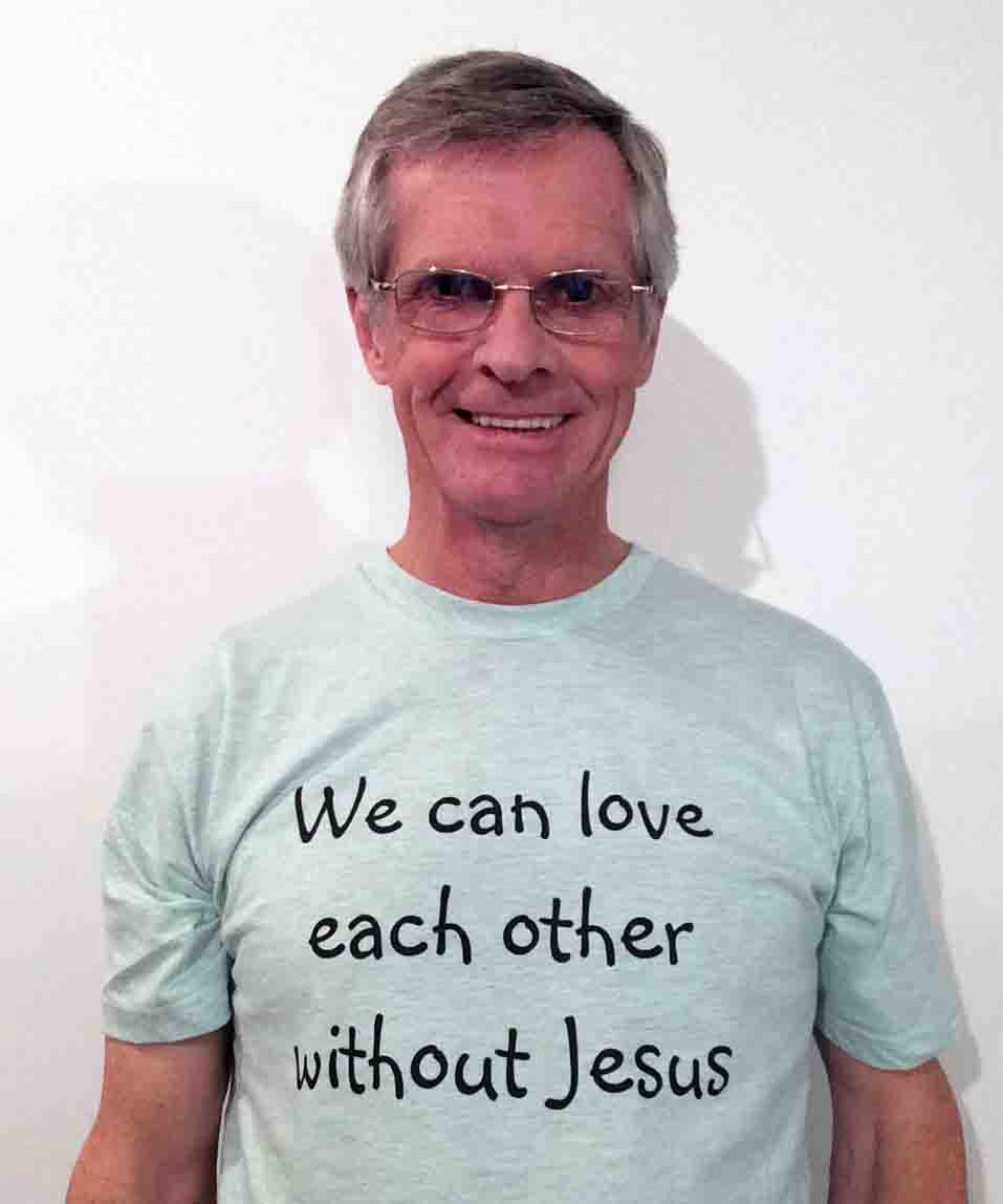 Darwin Bedford wearing his shirt that says 'We can love each other without Jesus'