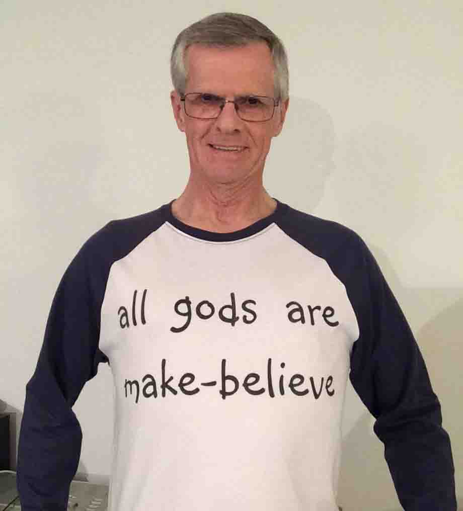 Darwin Bedford wearing his shirt that says 'all gods are make-belive'