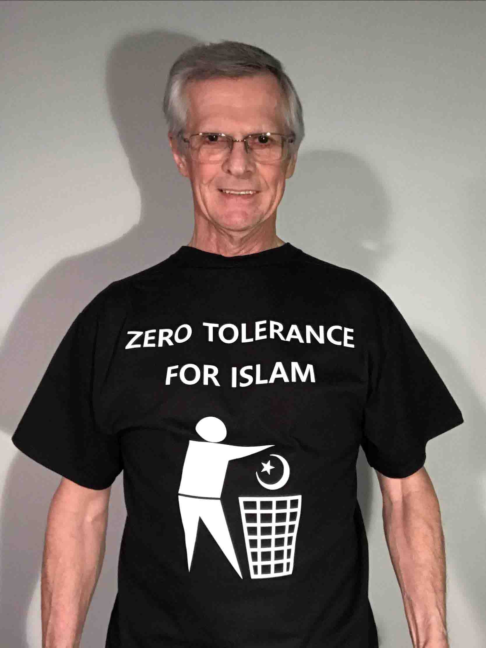 Darwin Bedford wearing his shirt that says 'zero tolerance for Islam'